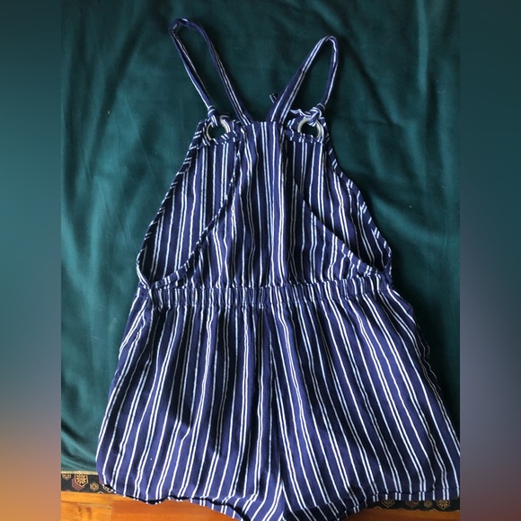 Derek Heart. This is in a size large. Black and white striped overalls. - Picture 2 of 3